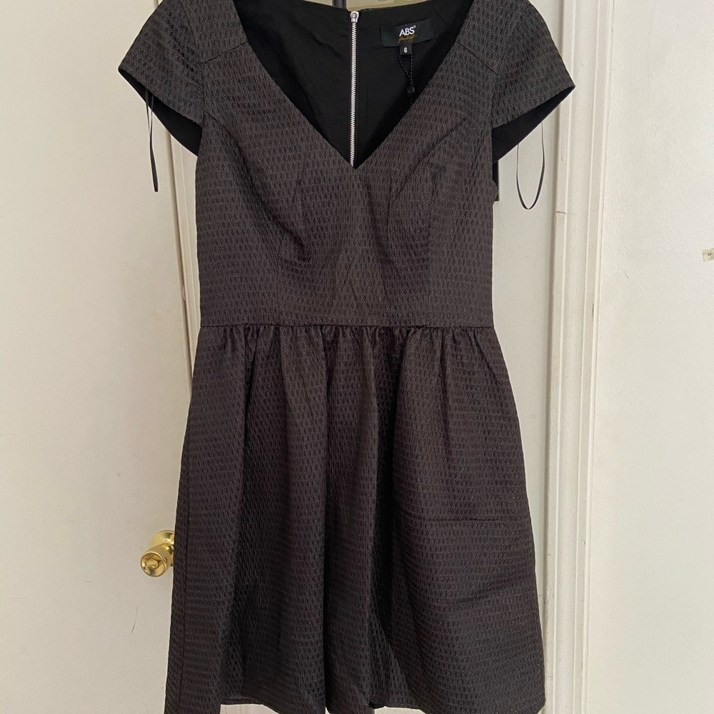 Brand New ABS black dress.